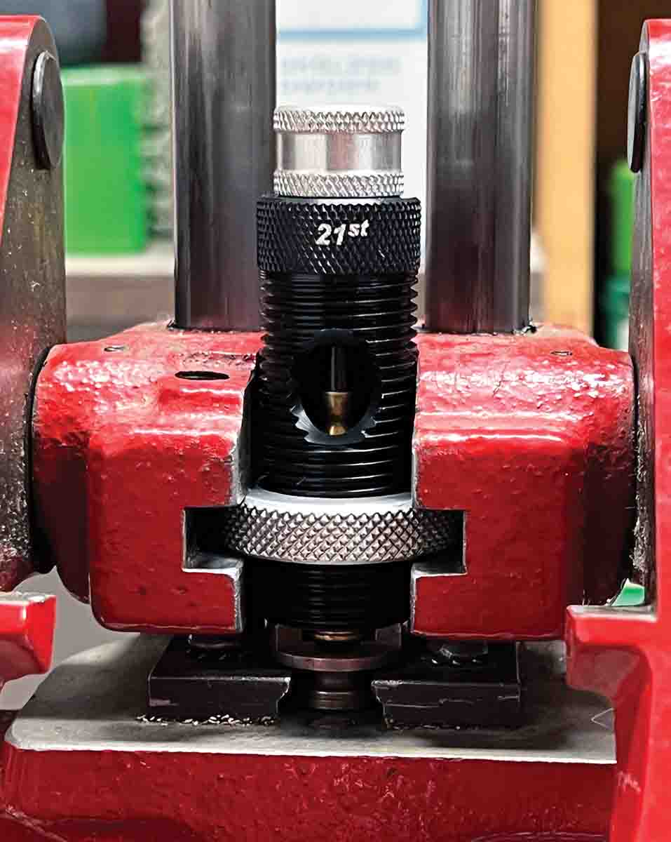 Setting the neck tension with a 21st Century expander mandrel die on the Forster Co-Ax press.